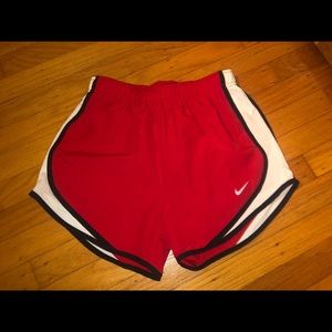 Red nike shorts